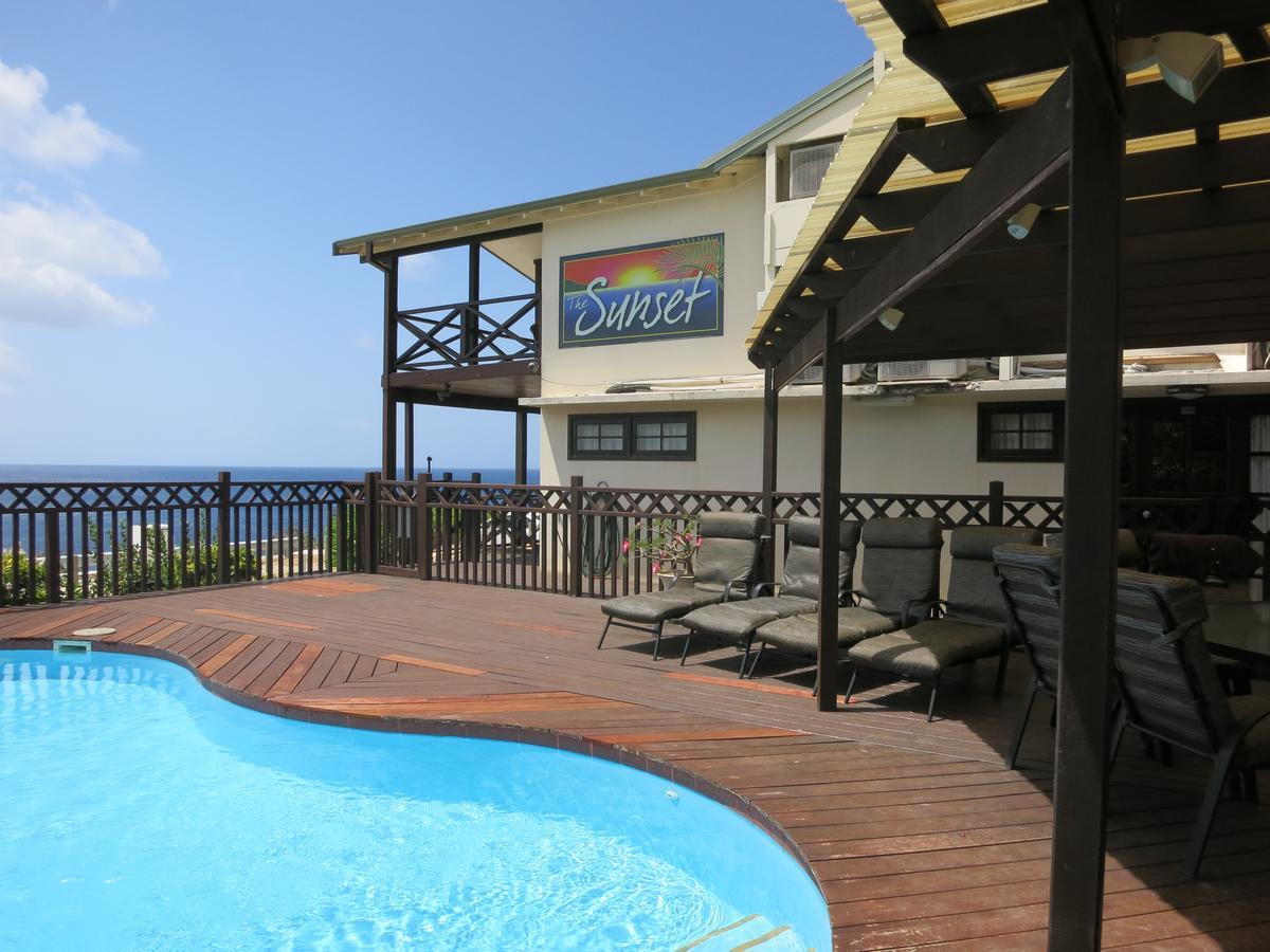 The Sunset Hotel Flying Fish Cove Buitenkant foto